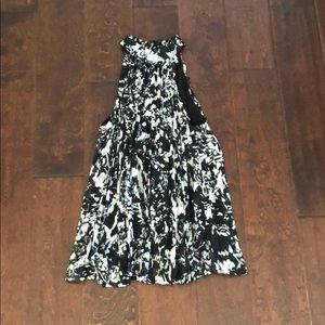 High neck, sleeveless blouse